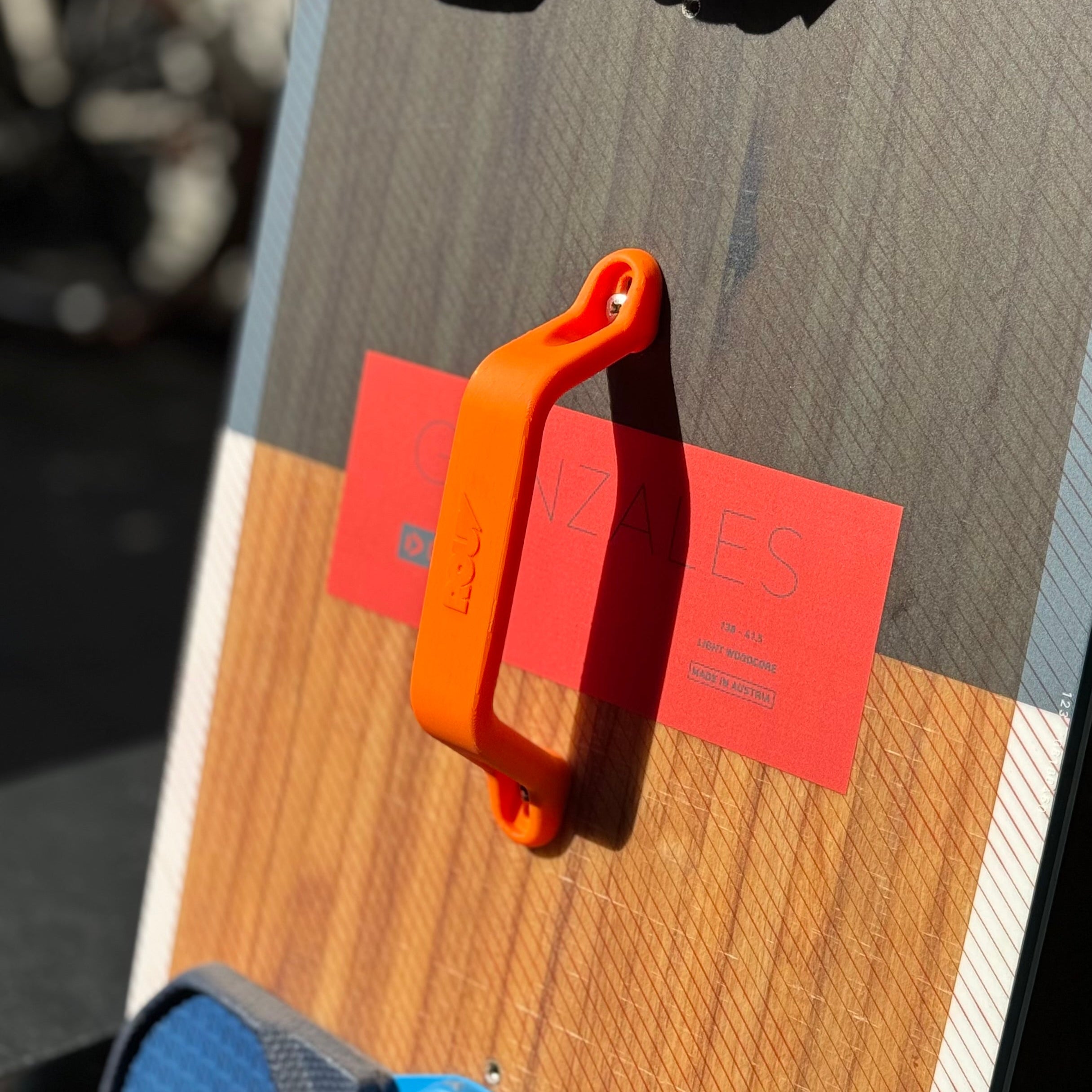 Poignée de kitesurf orange optimisé et imprimée en 3D